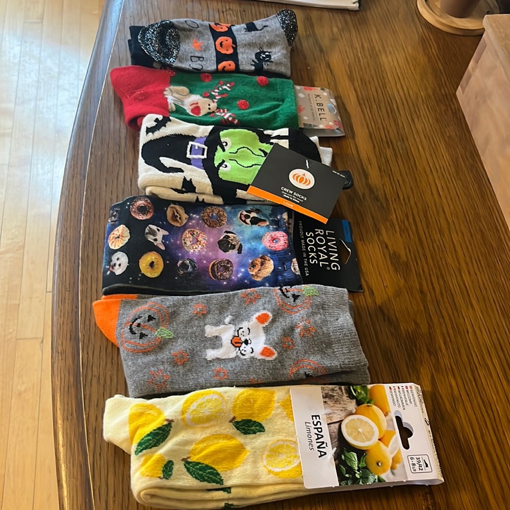 Assorted fun socks! All never worn and with tags.